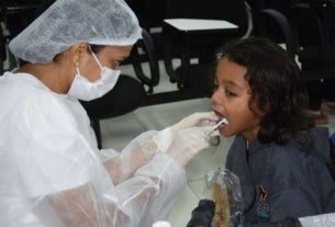 ação em odontologia no colégio helcias lira