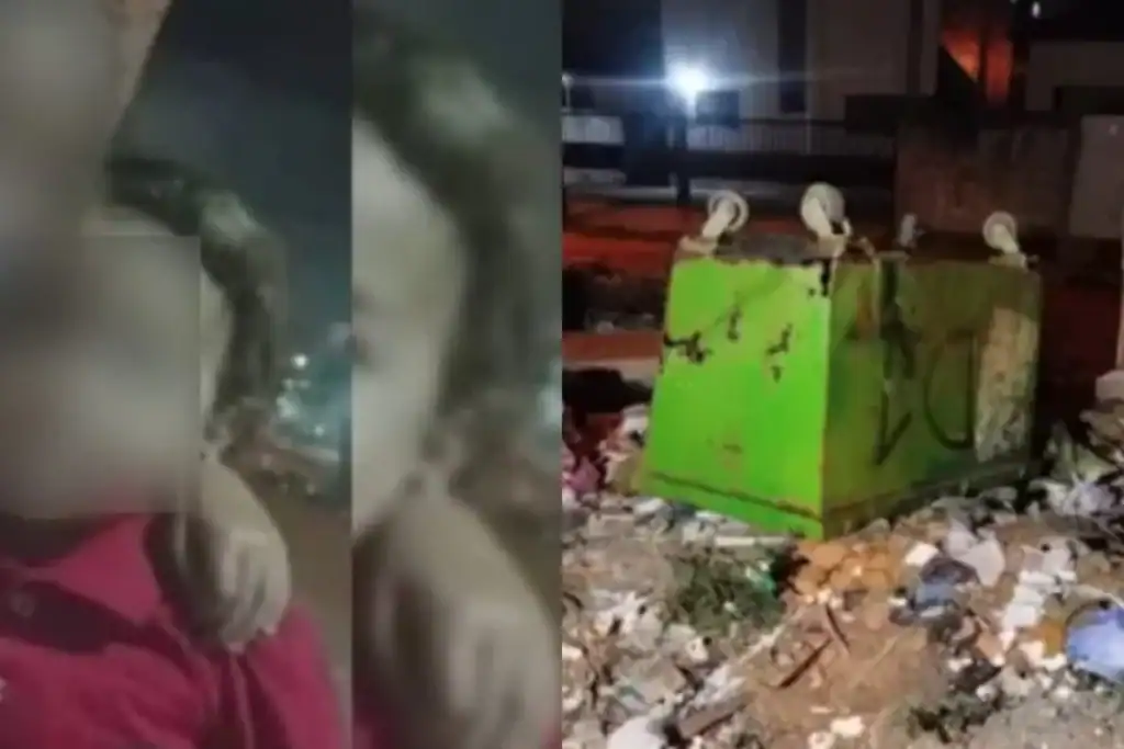 Caçamba de lixo tombada e danificada em rua de João Pessoa após o acidente.