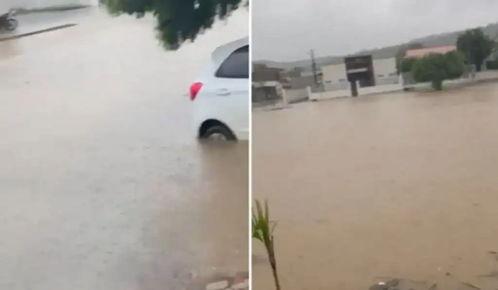 Estrutura de residência parcialmente desabada e rua alagada em Parnaguá, Piauí, após forte temporal.