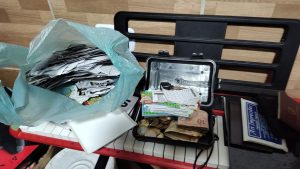 Policiais da SSP-PI em ação durante a Operação Macondo contra agiotagem, cumprindo mandados de prisão e busca e apreensão em cidades do Piauí.