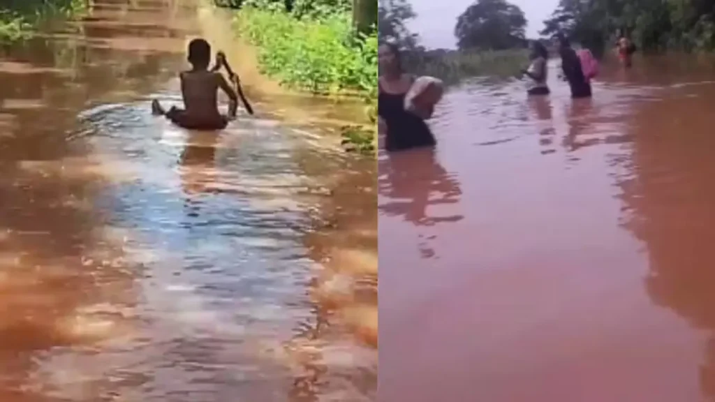 Chuvas isolam comunidade quilombola em Redenção do Gurguéia e destroem ponte 1 Pessoas atravessam trecho alagado com água na cintura após destruição de ponte improvisada que isolou a comunidade quilombola Brejão dos Aipins, Redenção do Gurguéia, Piauí.